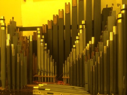 The Great wind chest with pipes in place in front of the Pedal flue pipes